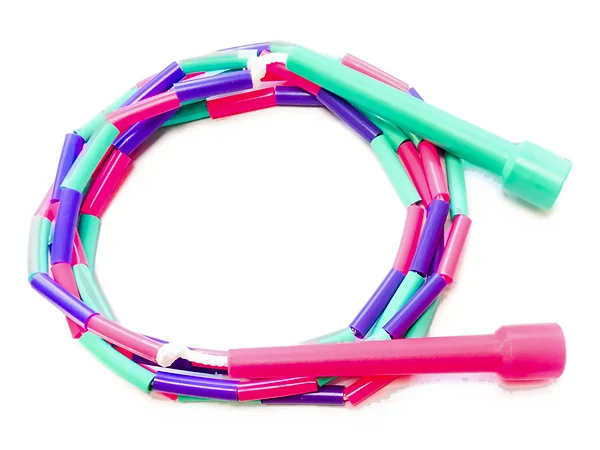 A skip-hop children's beaded skipping rope, pink, green and purple beads with one pink and one green handle